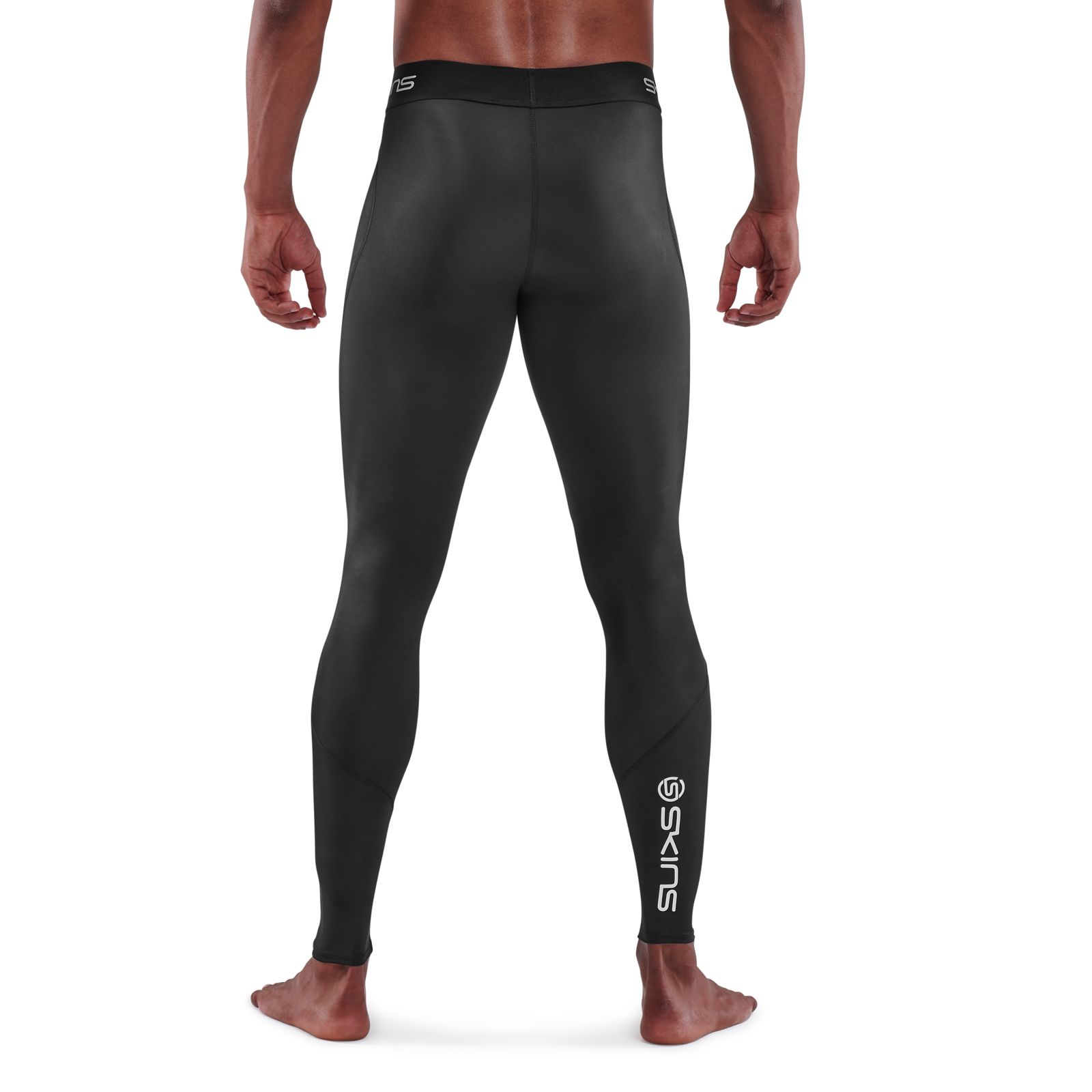 Skins Travel and Recovery Compression Tights in Black with Blue Stitching  size ML